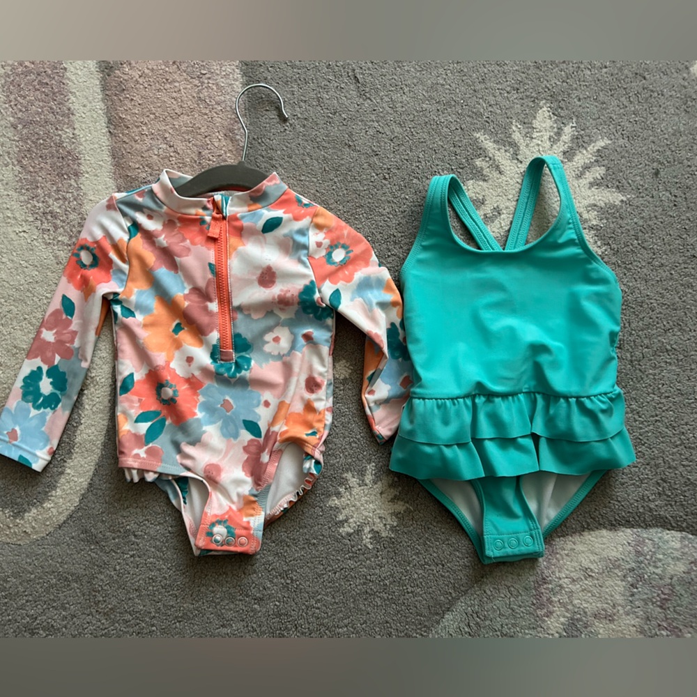Two baby girl swim suits Carter’s